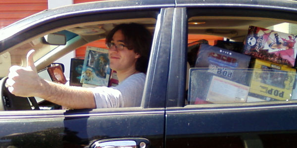 Me in a carfull of figures giving a thumbs-up